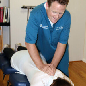 Chiropractor at Ravenswood Chiropractic in Chicago providing a spinal adjustment
